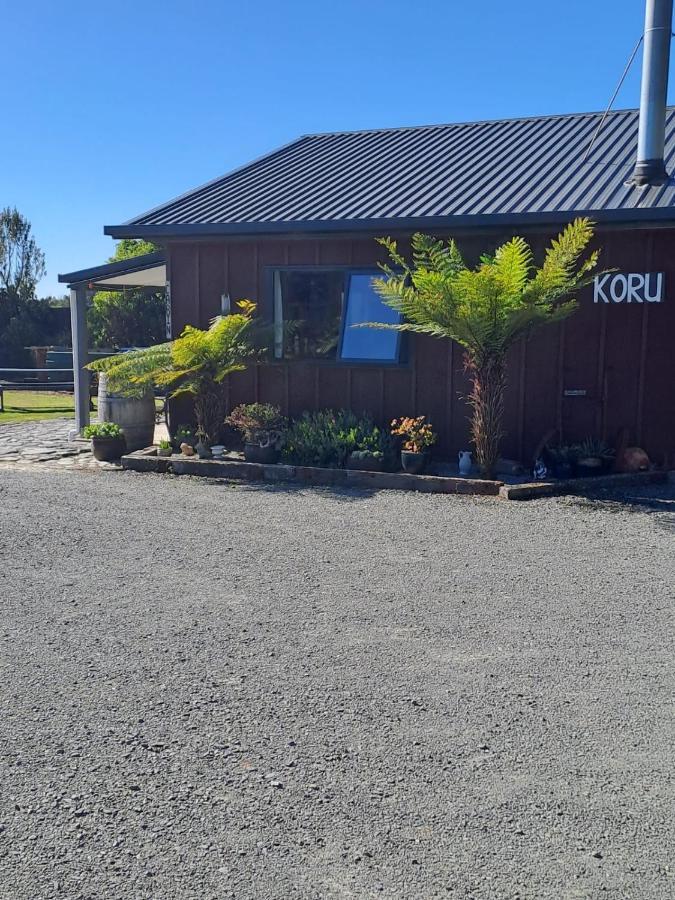 Privatunterkunft Koru Beachfront Holiday Cabins & Hot Tub